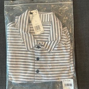 Adidas golf shirt.  New!